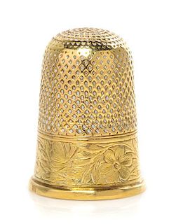 A Continental Gold Thimble, Height 7/8 inch.