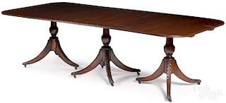 Federal style mahogany triple pedestal dining table