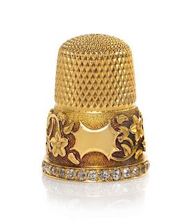A Gold and Diamond-Mounted Thimble, Height 7/8 inch.