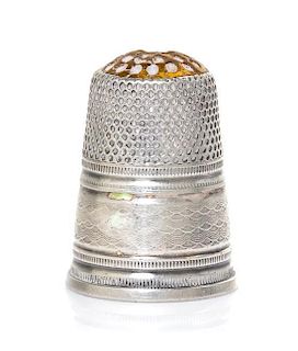 A Continental Parcel Gilt Silver Thimble, Height 1 inch.