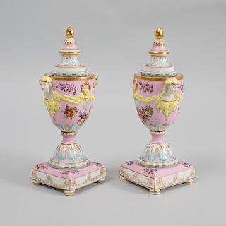 Pair of Berlin Pink Ground Porcelain Cassolettes and Covers