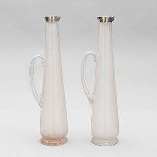 Pair of Victorian Silver-Mounted Ribbed Glass Claret Jugs, After a Design by Christopher Dresser