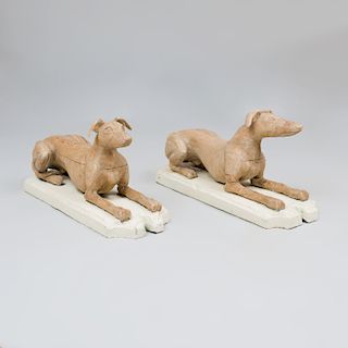 Pair of English Stripped Pine Models of Reclining Whippets 