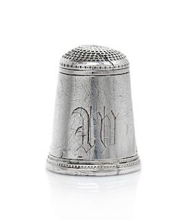 An American Silver Thimble, Height 7/8 inch.