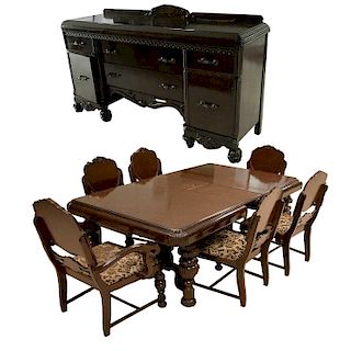 Comedor.S.XX. Elaborado en madera tallada y enchapada. Consta de: 5 sillas, sillón, mesa con sistema de extensiones y trinchador.Pzs:8