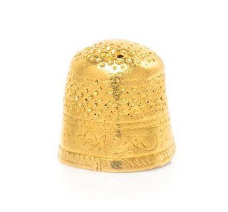 A Rare and Early American Gold Thimble, Height 5/8 inch.