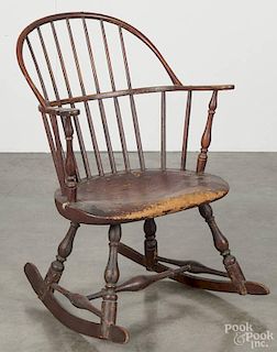 Pennsylvania painted sackback Windsor armchair, late 18th c., retaining an old red surface