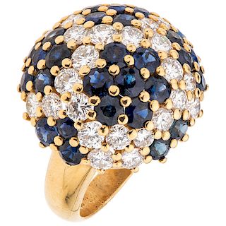 A sapphire and diamond 18K yellow gold ring.