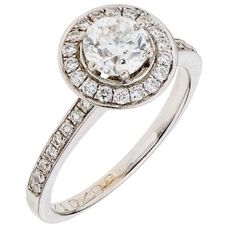 A diamond (one GIA certified) 14K white gold ring.