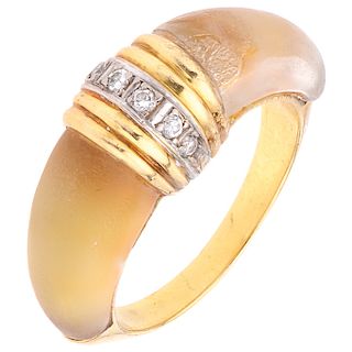 A quartz and diamond 18K yellow gold ring.
