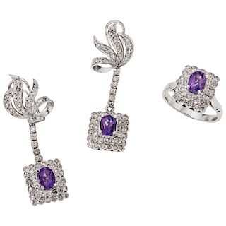An amethyst and diamond 8K white gold ring and pair of earrings set.
