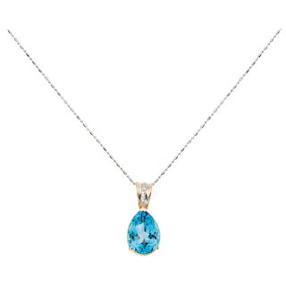 A topaz and diamond 14K yellow gold pendant and 14K white gold necklace.