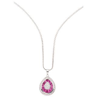 A ruby and diamond 18K white gold pendant and necklace.