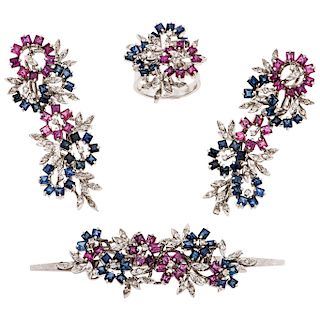 A sapphire, ruby and diamond palladium silver brooch, ring and pair of earrings set.