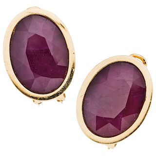 A ruby 14K yellow gold pair of earrings.