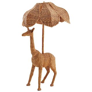MARIO LÓPEZ TORRES. Años 70. Lámpara de mesa. Estructura de metal y tejido de chuspata con aplicaciones de latón. Diseño de jirafa.
