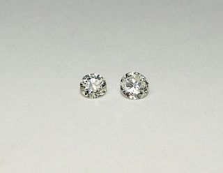 2 Very Fine Approx .25CT Diamonds
