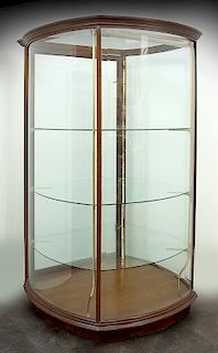 Mahogany curved glass shop display case,