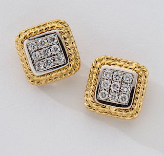 18K gold and diamond earrings.
