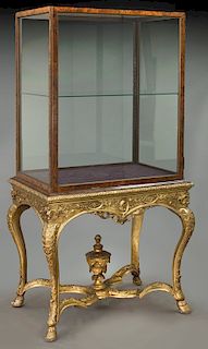 Curio cabinet on gilt gesso stand,