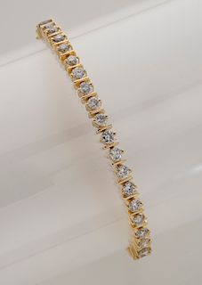 14K gold and diamond line bracelet.