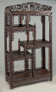 Chinese Qing carved rosewood curio cabinet,