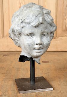 PETITE ZINC SCULPTURE OF CHILD'S HEAD ON STAND