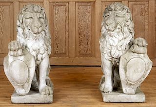 PAIR CAST STONE SEATED LIONS & SHIELD SCULPTURES