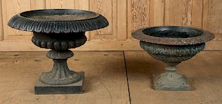 TWO PAINTED CAST IRON GARDEN URNS CIRCA 1880