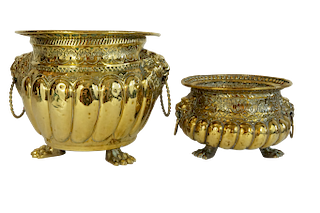 Two Dutch Repousse Jardinieres with Lion Handles and Paw Feet