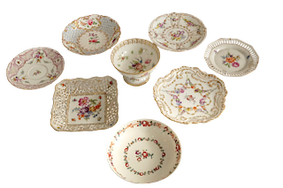 Eight Floral Porcelain Pieces 