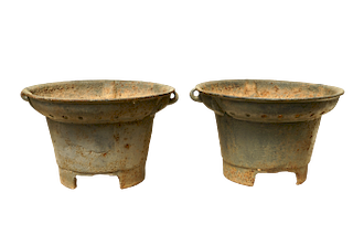 Two Cast Iron Vessel Pots