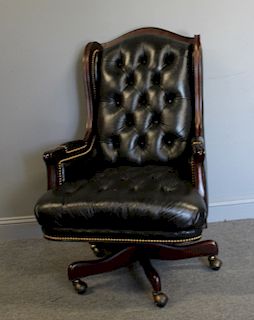 Robb Stucky Leather Upholstered Swivel Chair.