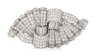 A Pair of Platinum, White Gold and Diamond Brooches, 27.20 dwts.