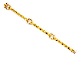 An 18 Karat Yellow Gold, Yellow Sapphire and Diamond Bracelet, Hasbani, 12.20 dwts.
