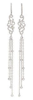 A Pair of White Gold and Diamond Dangle Earrings, 6.00 dwts.