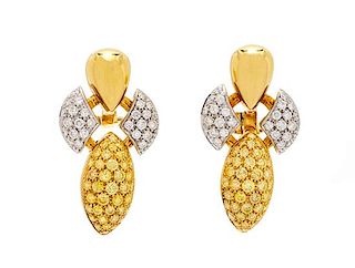 A Pair of 18 Karat Bicolor Gold, Colored Diamond and Diamond Earclips, 15.70 dwts.