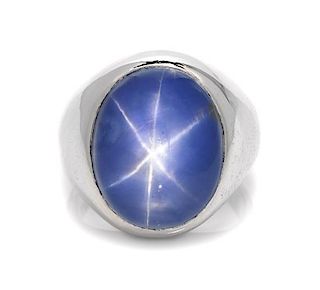 A 14 Karat White Gold and Star Sapphire Ring, 17.30 dwts.
