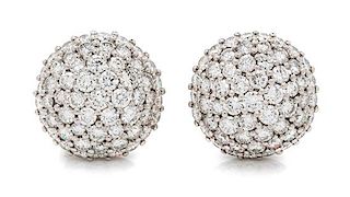 A Pair of Platinum and Diamond Dome Earclips, 17.00 dwts.