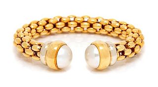 An 18 Karat Bicolor Gold and Cultured Mabe Pearl Cuff Bracelet, FOPE, 33.50 dwts.