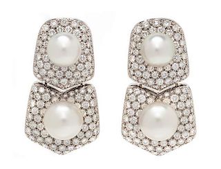 A Pair of Platinum, Cultured South Sea Pearl and Diamond Convertible Earclips, Montreaux, 36.30 dwts.