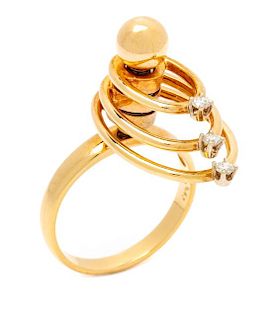 A 14 Karat Yellow Gold and Diamond 'Swinger' Ring, TEUFEL, Circa 1975, 3.90 dwts.