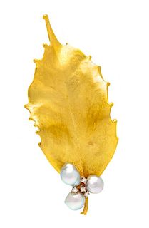 An 18 Karat Yellow Gold, Cultured Baroque Pearl and Diamond Leaf Motif Brooch, Vendorafa, 6.80 dwts.