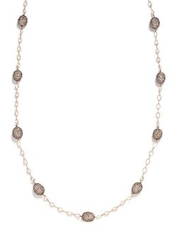 An 18 Karat Rose Gold, Colored Diamond and White Topaz Longchain Necklace, Damaso Martinez, 39.50 dwts.
