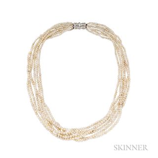 18kt White Gold, Diamond, and Pearl Torsade, Cartier, six strands, the pearls ranging in size from approx. 2.00 to 4.34 x 4.03 mm, the
