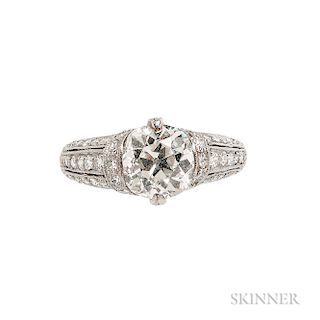 Art Deco Platinum and Diamond Ring, set with an old European-cut diamond weighing approx. 1.80 cts., old European-cut diamond melee, mi