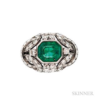 Platinum, Emerald, and Diamond Ring, c. 1950, bezel-set with an emerald-cut emerald measuring approx. 10.00 x 8.50 x 7.30 mm, with full
