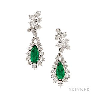 Platinum, Emerald, and Diamond Day/Night Earclips, set with pear-shape emeralds each measuring approx. 14.50 x 6.50 x 3.50 mm, total wt