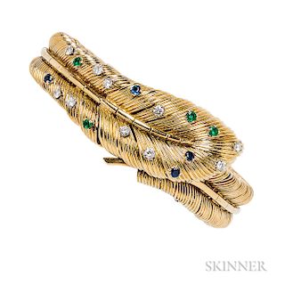 18kt Gold Gem-set Covered Wristwatch, Tiffany & Co., France, c. 1950s, designed as a feather set with sapphires, emeralds, and full-cut