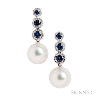 18kt White Gold, South Sea Pearl, Sapphire, and Diamond Earrings, the pearls measuring approx. 12.30 and 12.90 mm, suspended from circu